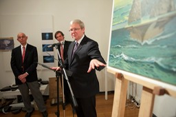Kevin Rudd discussing paintingS